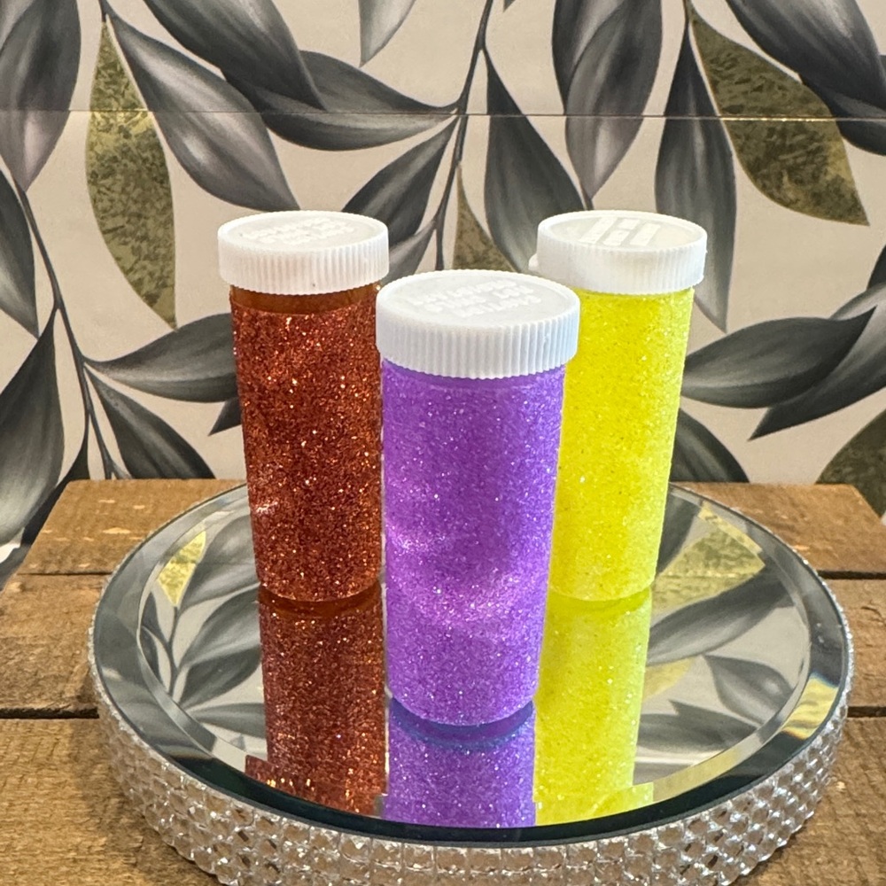 Handmade glittered medicine bottles